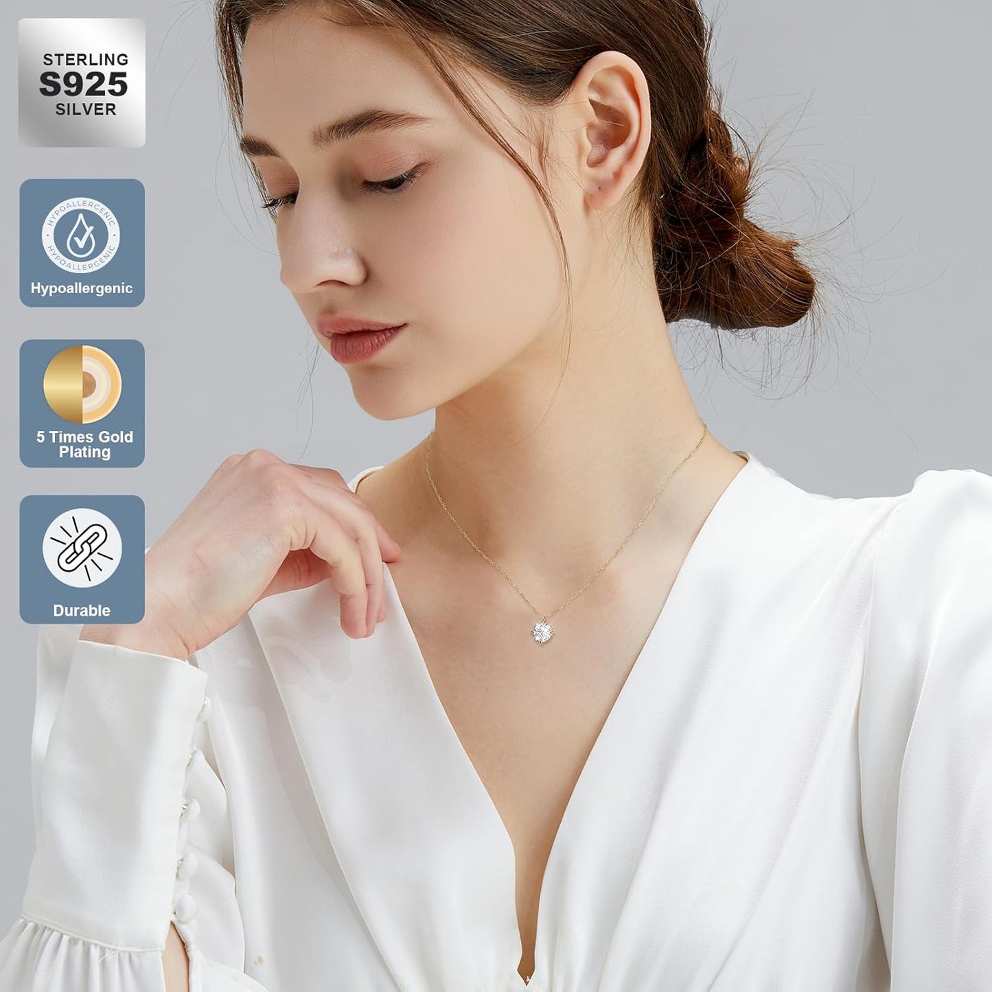 Elegant woman wearing a 14K gold solitaire necklace that enhances her outfit with a subtle sparkle