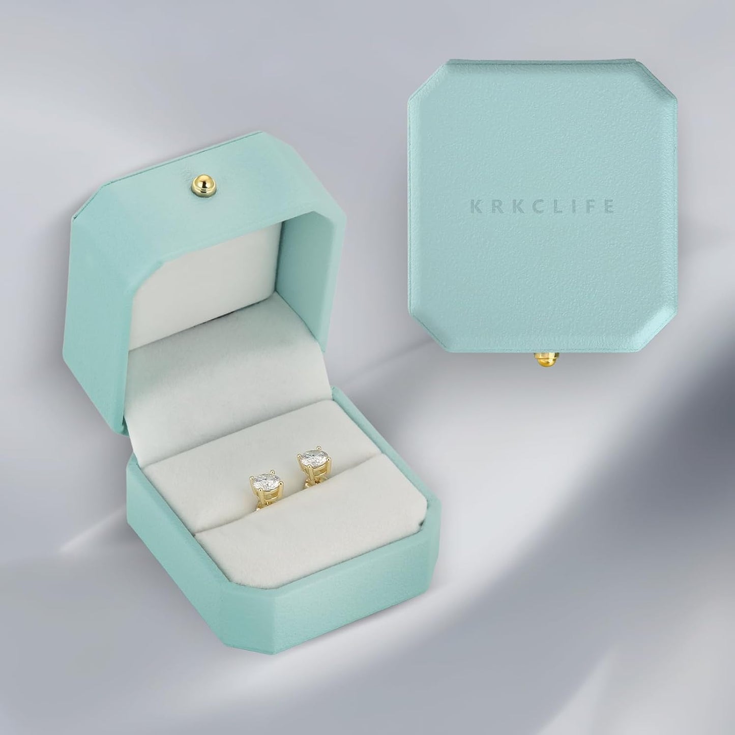 Elegant 0.6-3 CT moissanite jewelry earrings in a stylish blue gift box for special occasions