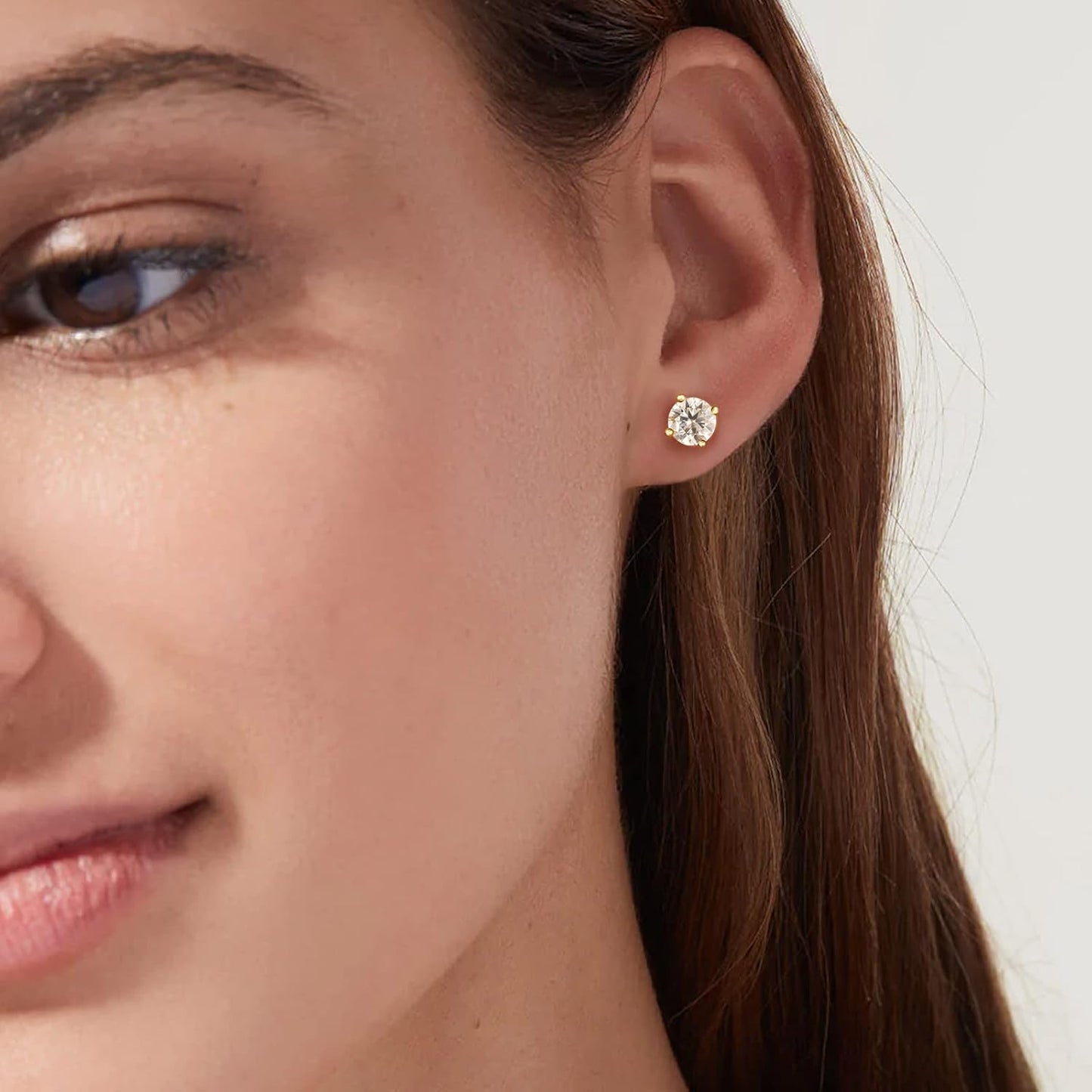 Elegant 0.6-3 CT moissanite jewelry earrings displayed on a model for a chic look