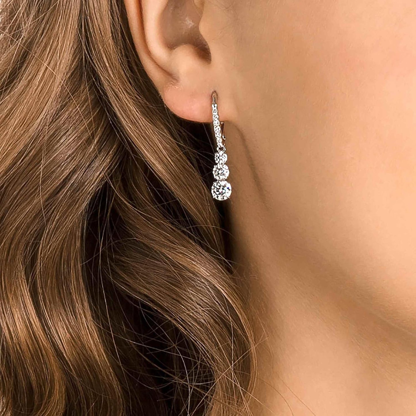 Elegant Swarovski Stilla jewelry earrings with sparkling drop design, perfect for any occasion