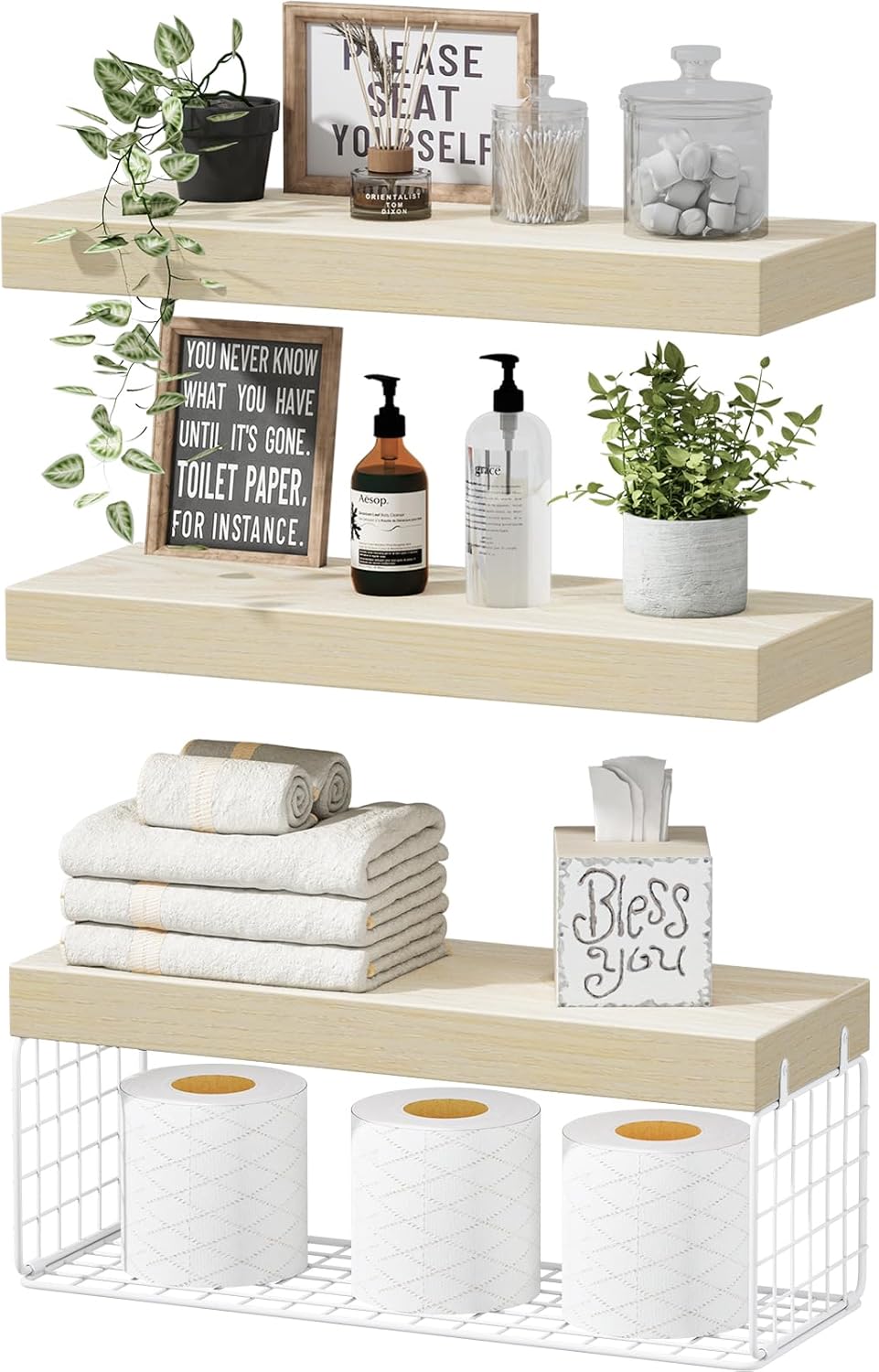 Floating shelves over toilet with decorative items, towels, and toilet paper storage for bathroom organization