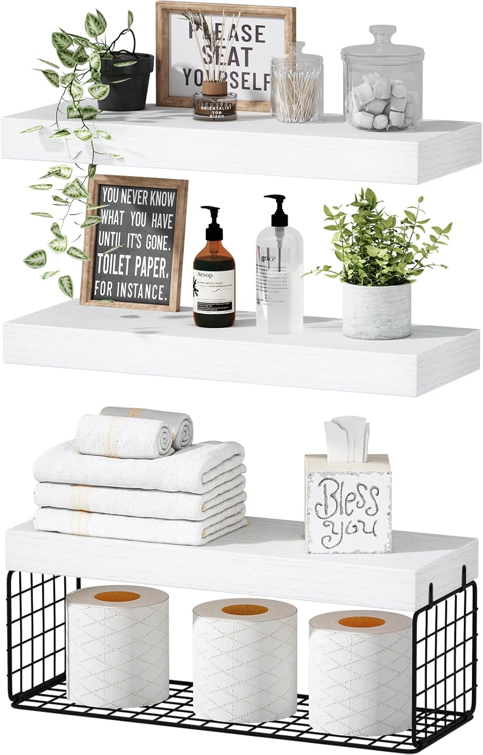 Stylish floating shelves over toilet with decorative plants and storage for towels and toiletries