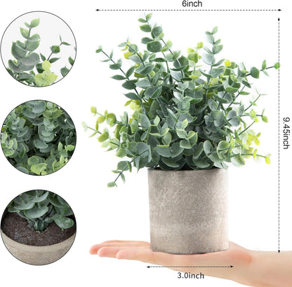 Fixtur Services artificial eucalyptus plants in a gray pot, showcasing realistic greenery and compact size