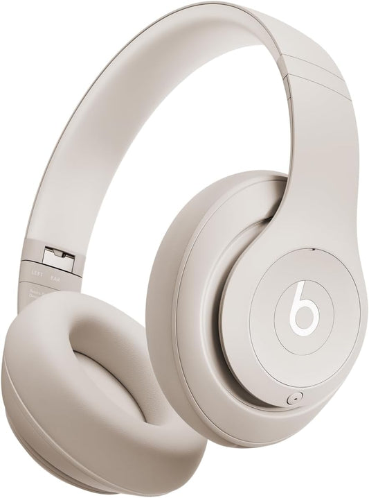 Beats Studio Pro wireless headphones in beige with plush ear cushions for comfort and style