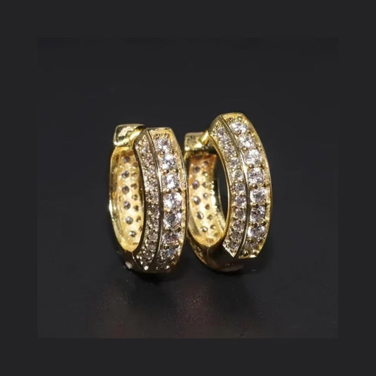 Elegant gold cubic zirconia hoop earrings featuring sparkling stone detailing for a chic look