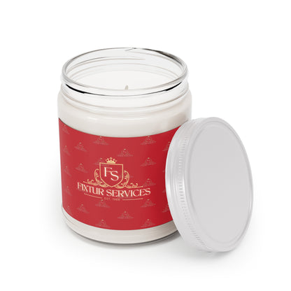 Luxury scented soy candle in a glass jar with a decorative red label for home decor