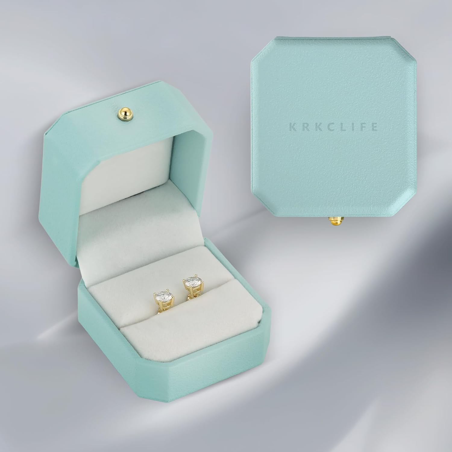 Elegant 0.6-3 CT moissanite jewelry earrings in a stylish blue gift box for special occasions