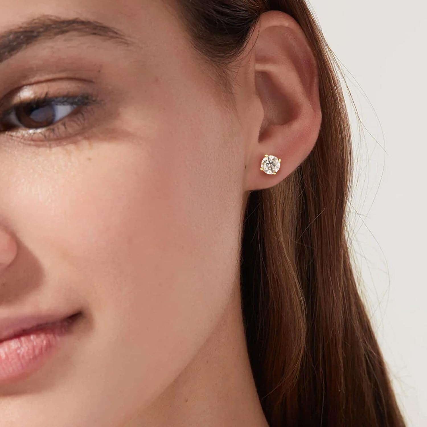 Elegant 0.6-3 CT moissanite jewelry earrings displayed on a model for a chic look