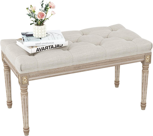 Elegant upholstered bedroom bench with tufted seat and decorative wooden legs, perfect for any bedroom decor